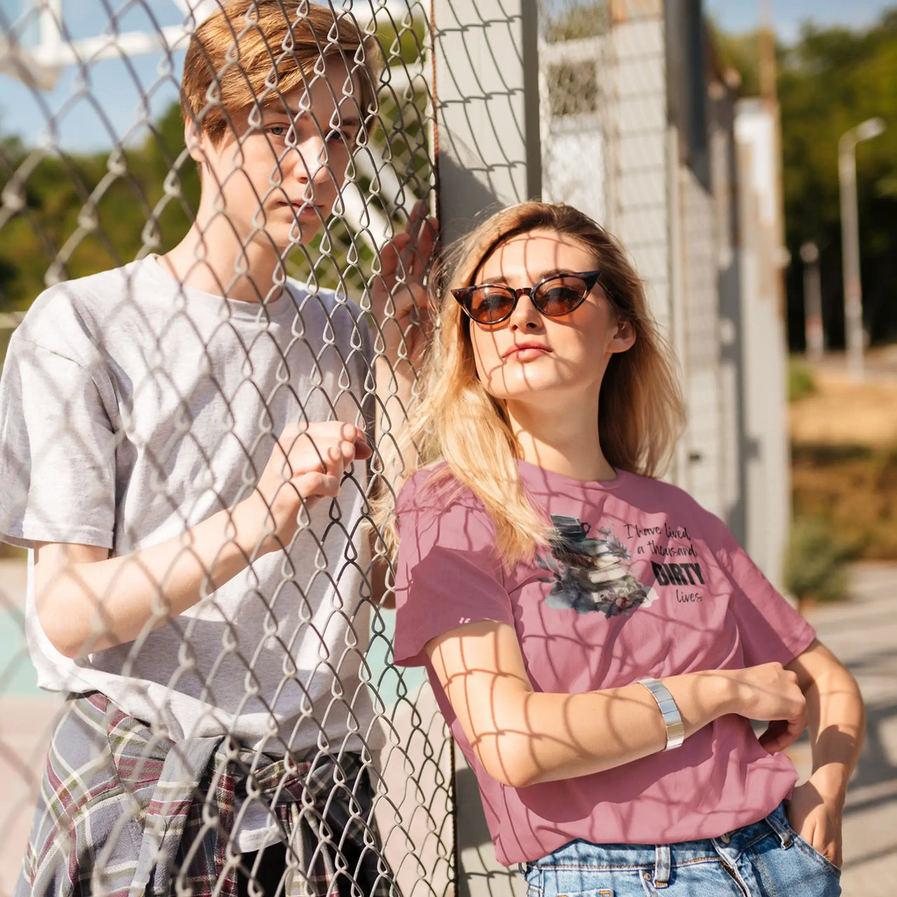 young woman in sunglasses with her boyfriend dark pink I have lived a 1000 dirty lives tshirt V2