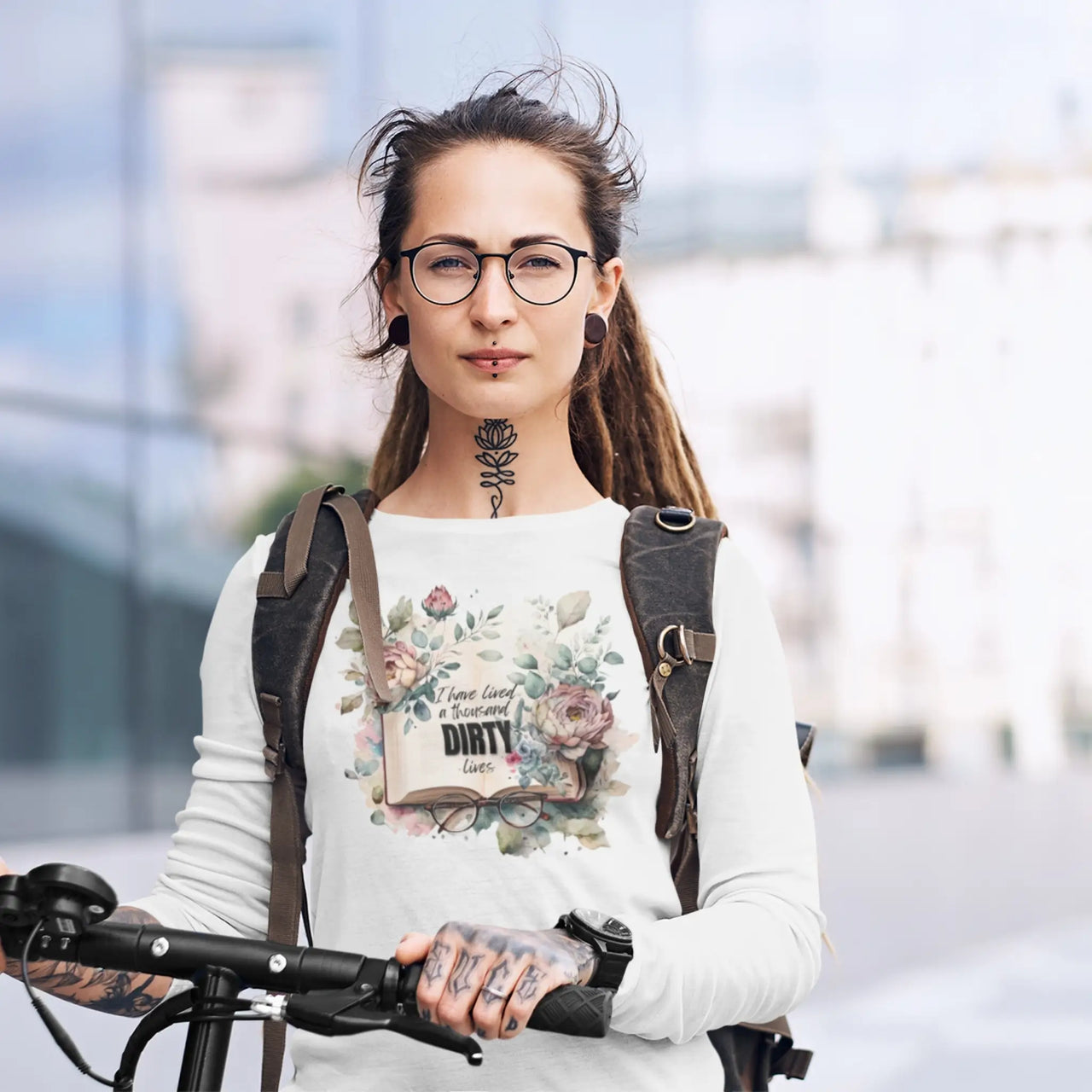 woman wearing a 1000 dirty lives long tee in white version C