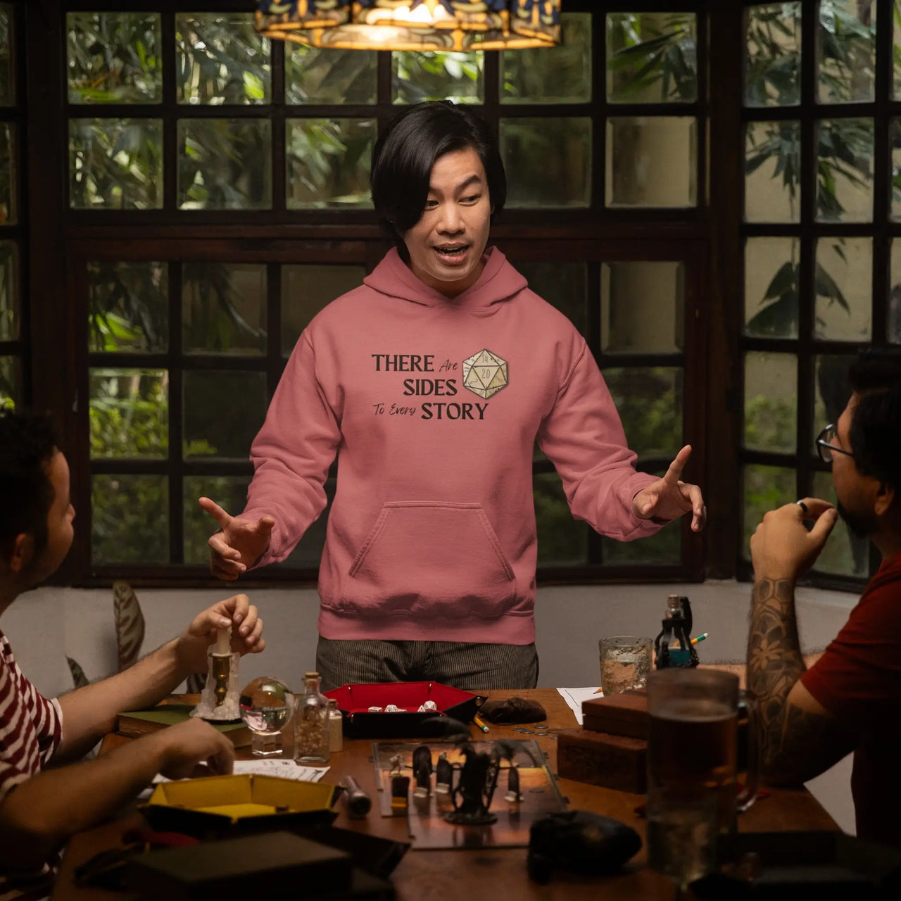 a guy wearing a dark pink There are 20 sides to every story hoodie