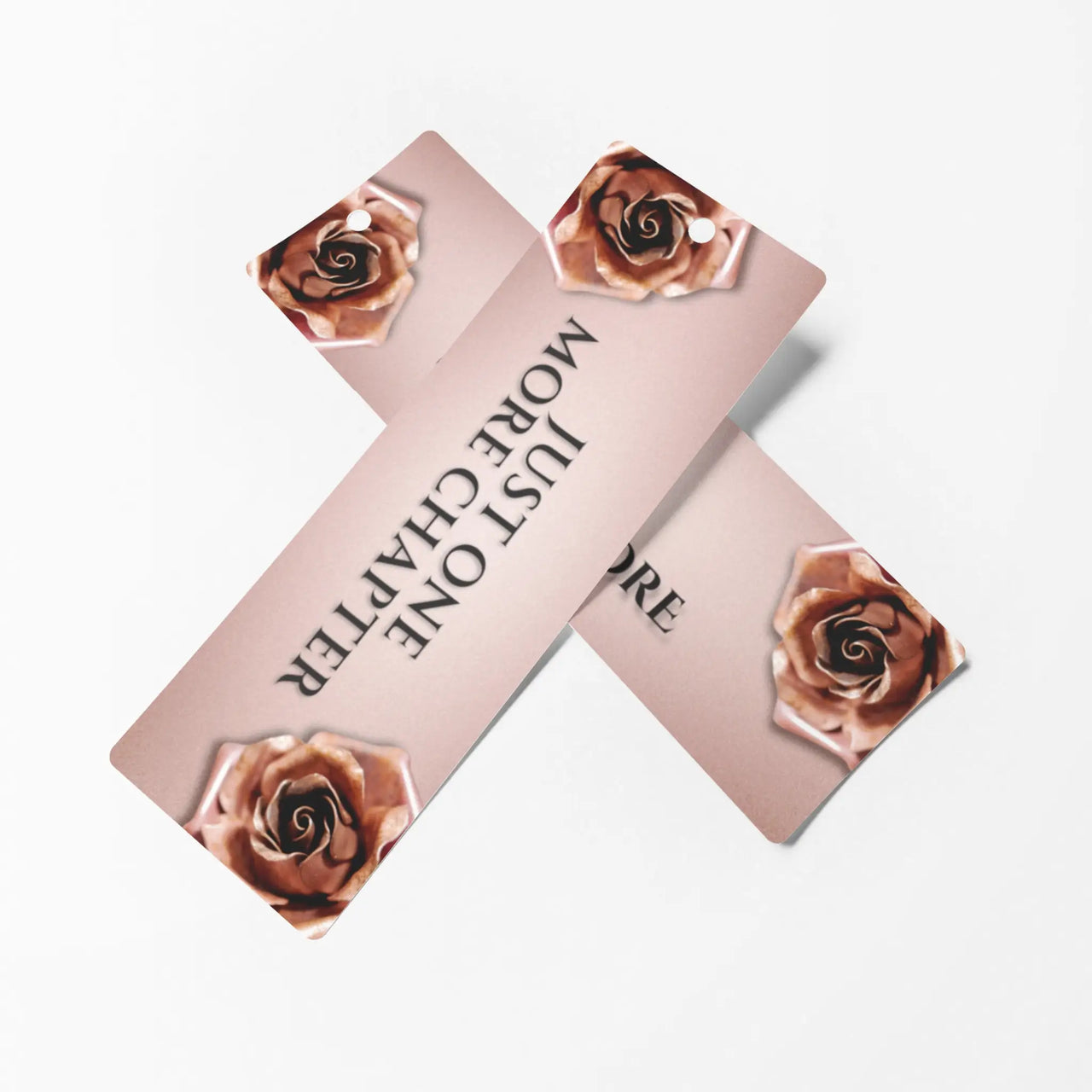 Both sides of pink version of just one more chapter bookmark with roses