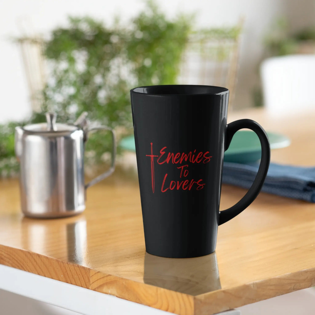 Black Large Enemies To Lovers Mug on a kitchen table