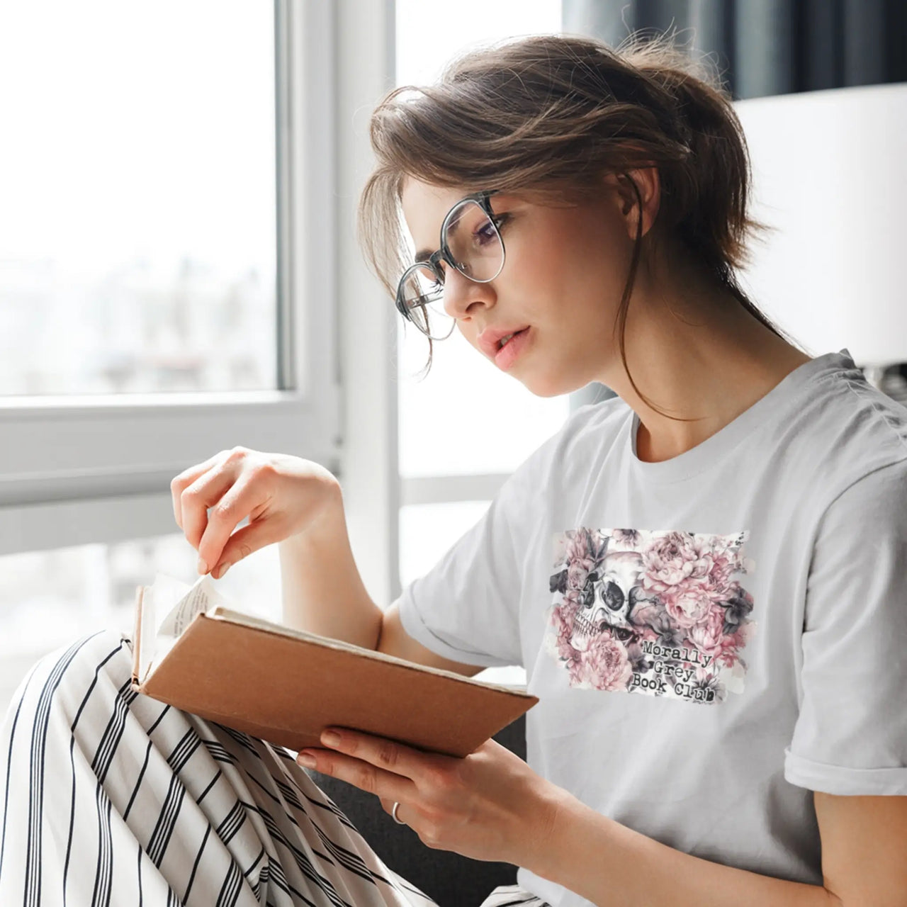 reading wearing a light grey morally grey tshirt v2