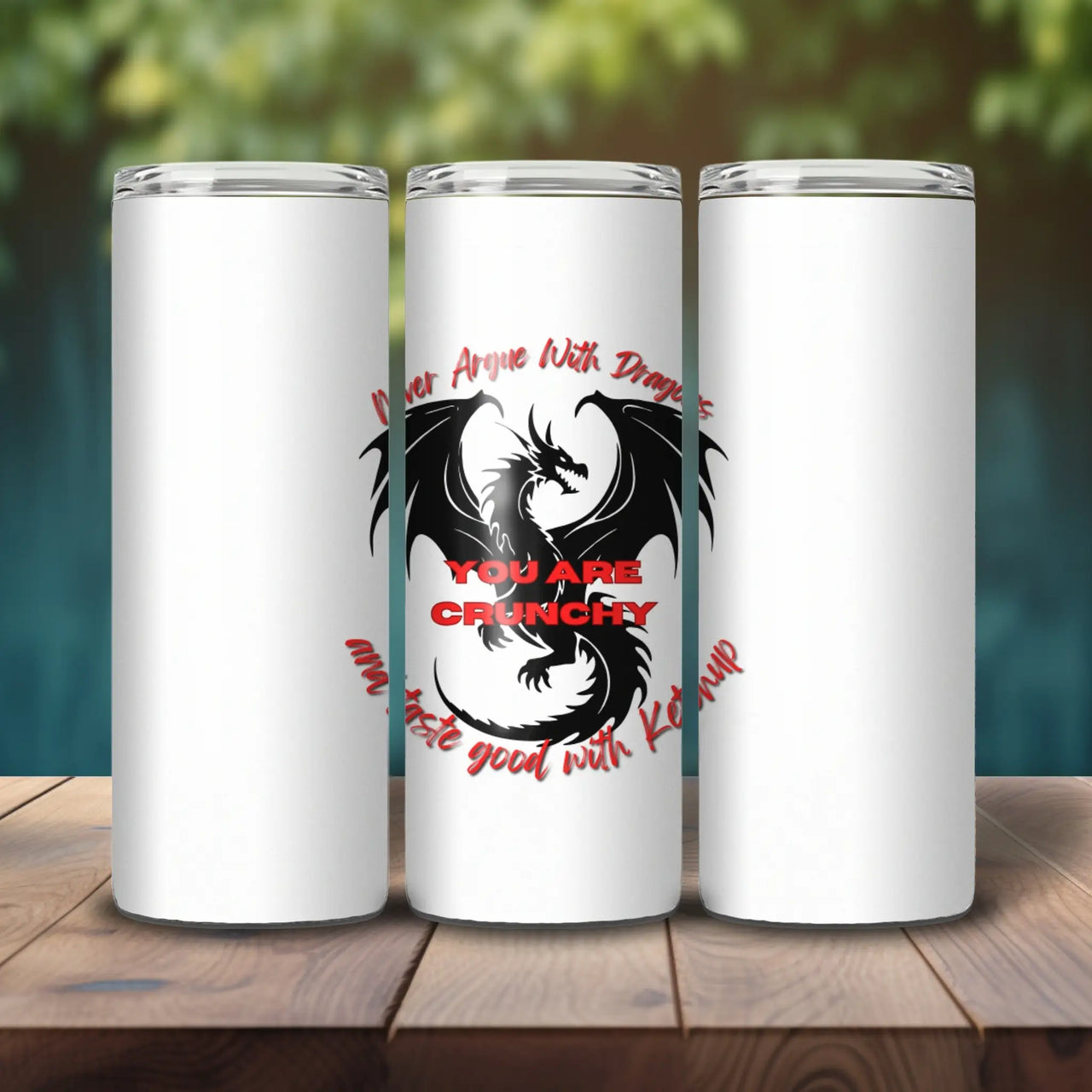 Never argue with dragons skinny tumbler on a wood table