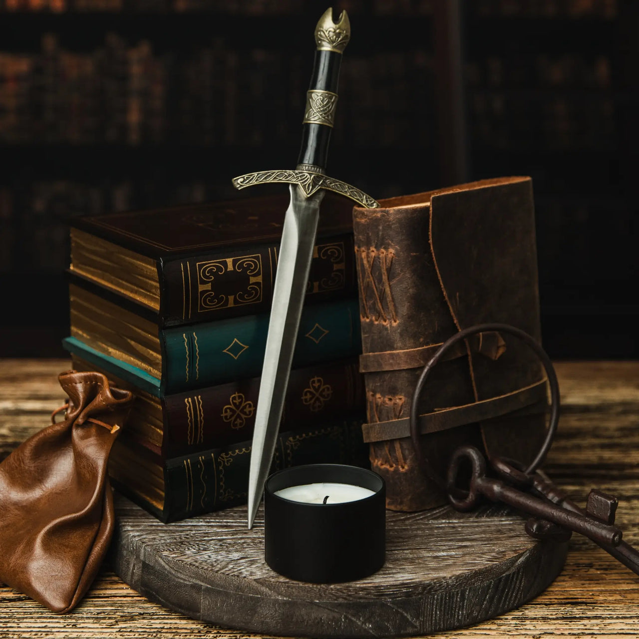 candle with keys, and dagger