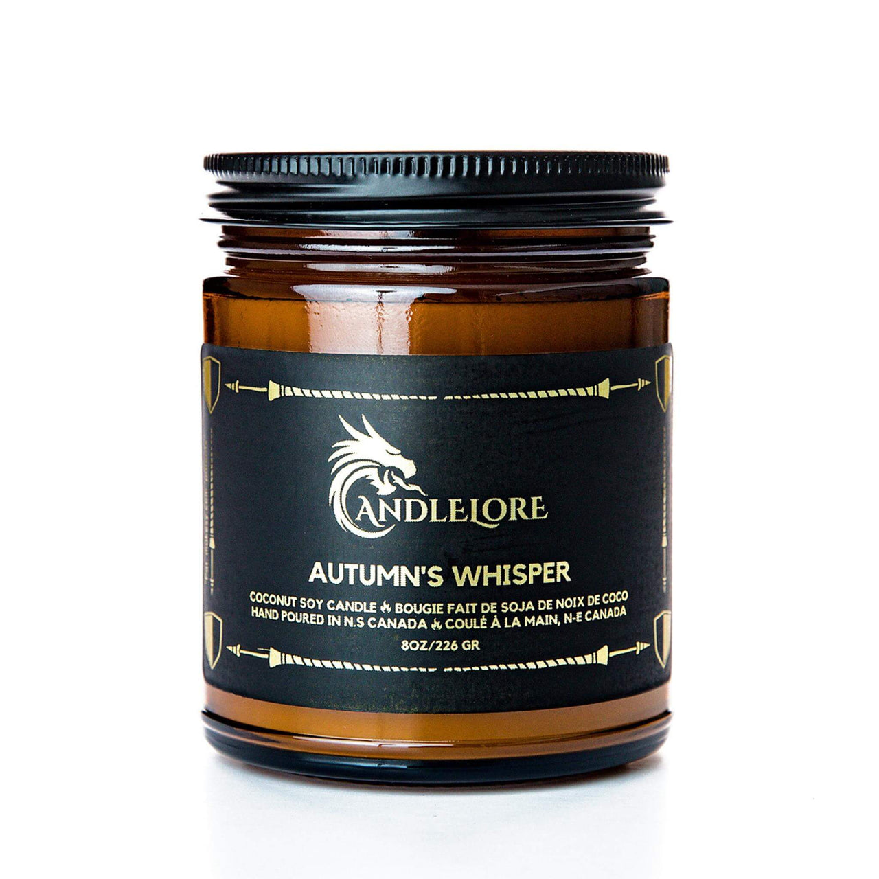 Medium Autumn's Whisper scented candle on a white background