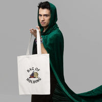 Thumbnail for a guy in a green cloak with a white bag of holding themed tote