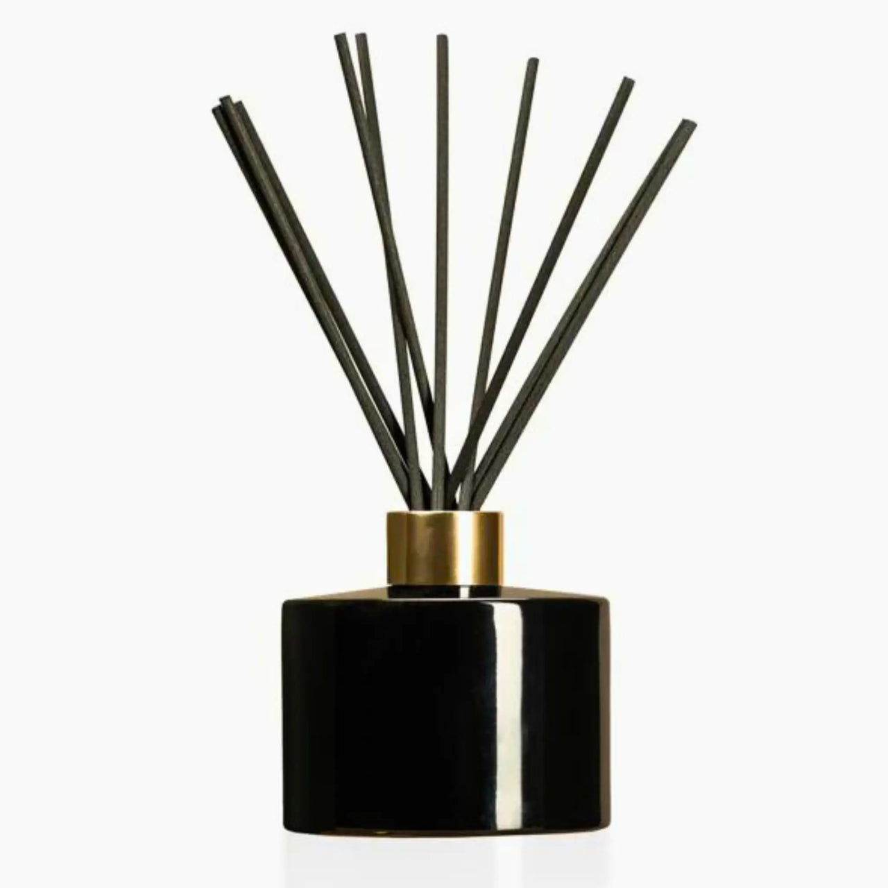 Reed diffuser on white background