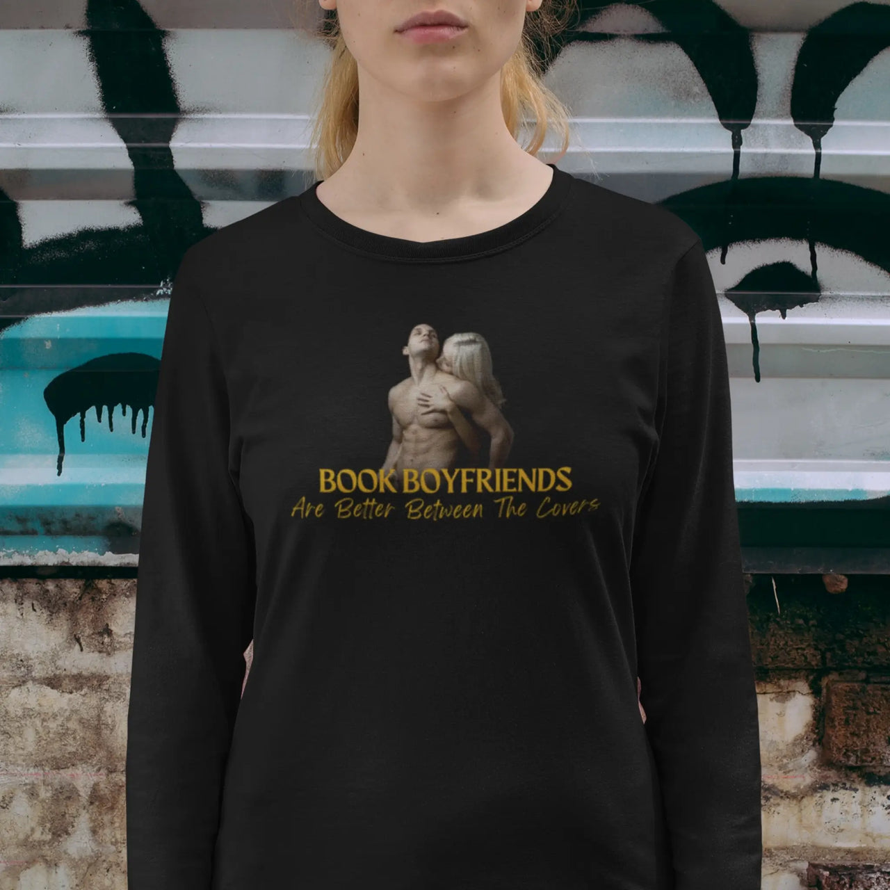 woman wearing a Book Boyfriends Are Better Between The Covers long sleeve t-shirt in black