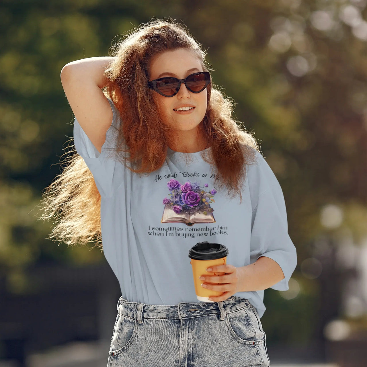 woman wearing a books or me tshirt in blue