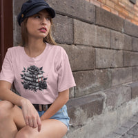 Thumbnail for young woman with a hat wearing a light pink books and roses t-shirt