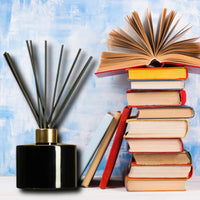 Thumbnail for a reed diffuser beside books