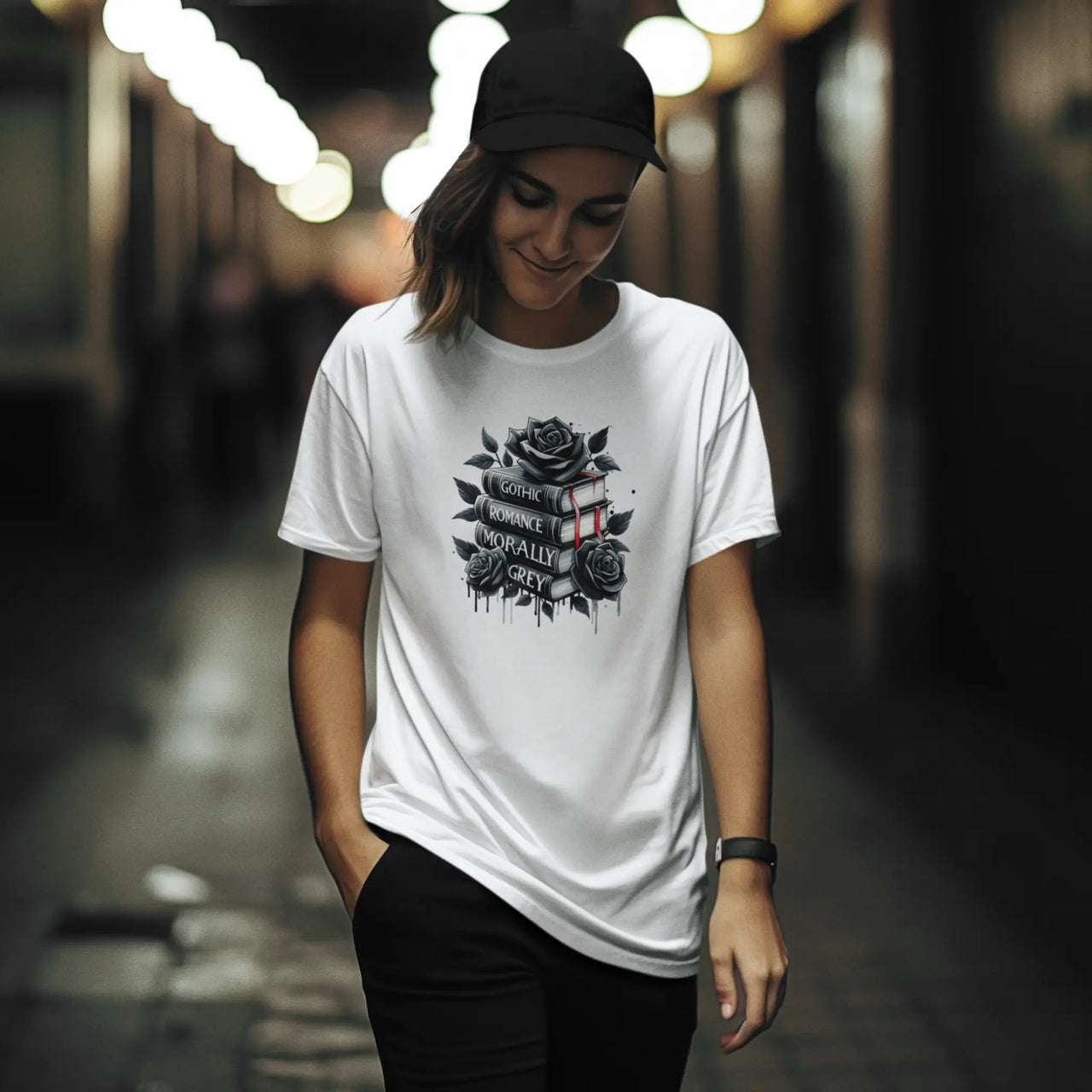 woman with a cap wearing a books and roses tshirt in white