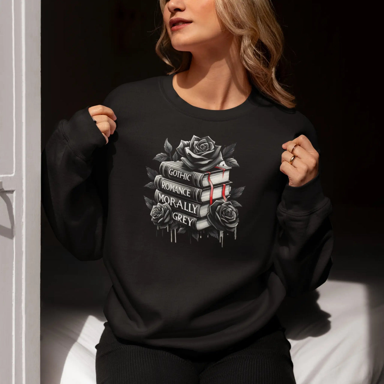 Young woman proudly displaying her Black Books And Roses Sweatshirt