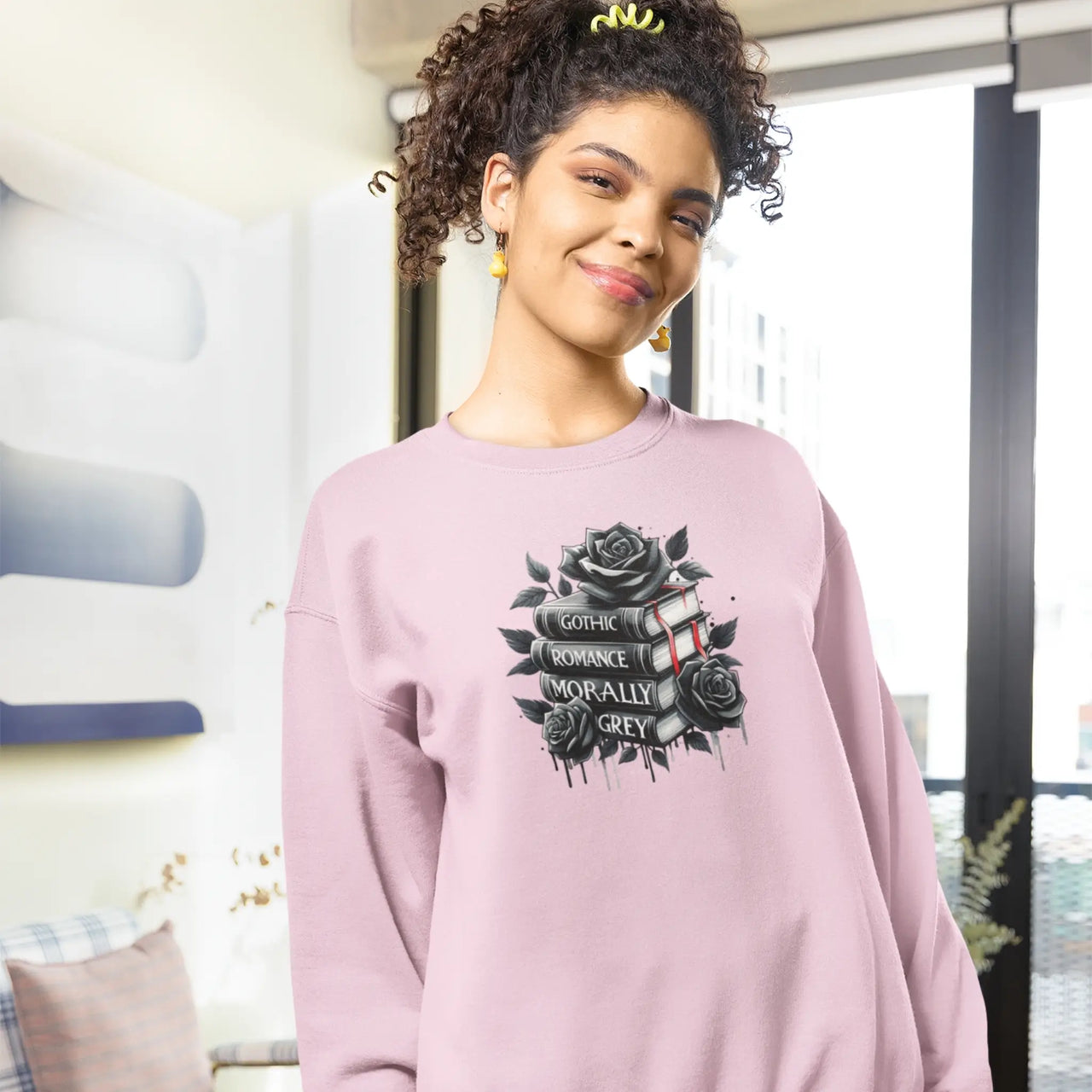 woman displaying a Pink Books And Roses Sweatshirt