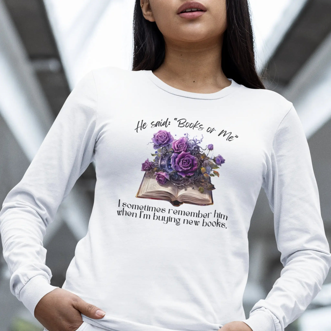 a young woman showing off a Books or Me long sleeve tshirt in white