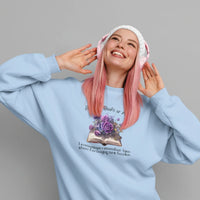 Thumbnail for woman wearing a blue Books or Me sweatshirt