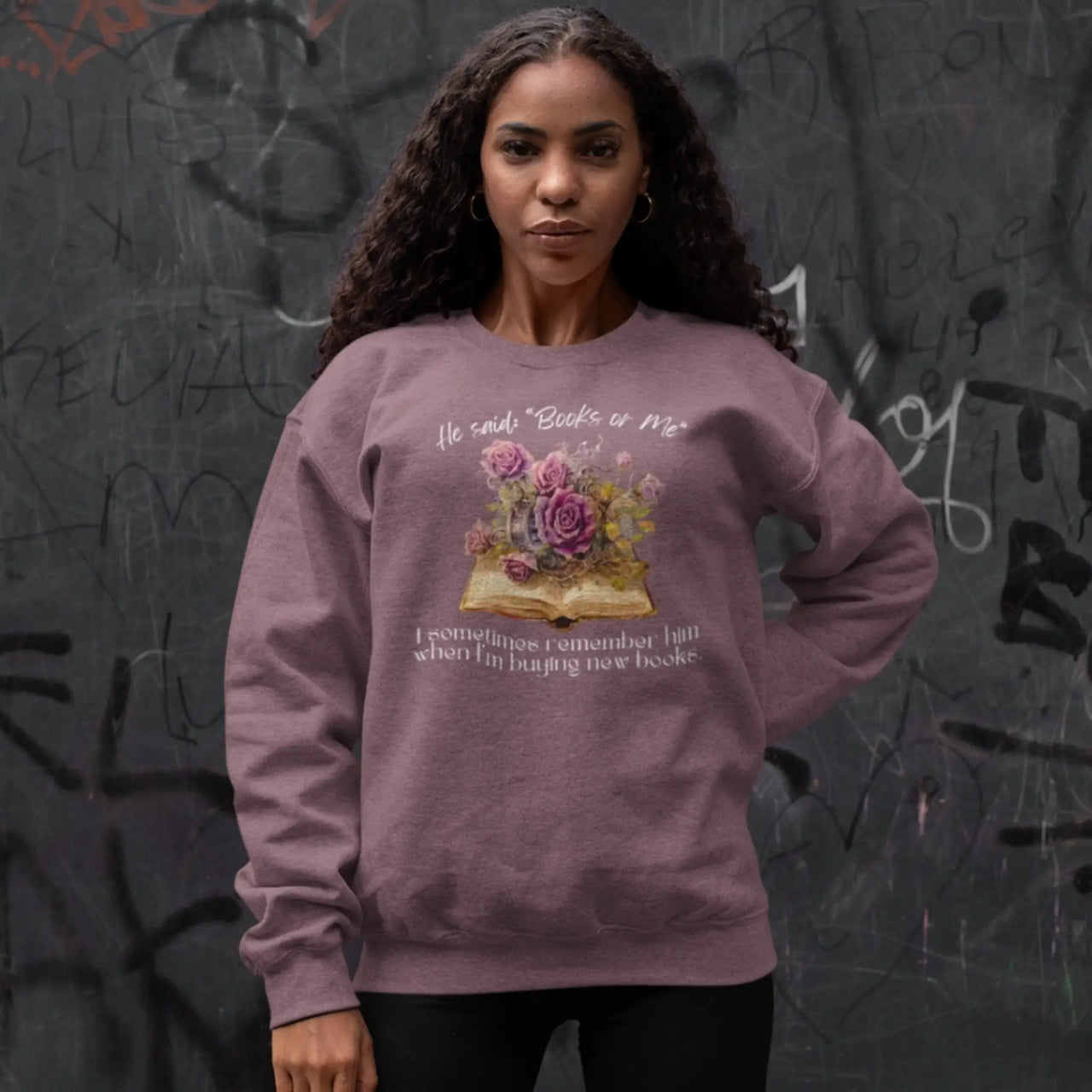 woman posing with a Maroon Books or Me sweatshirt