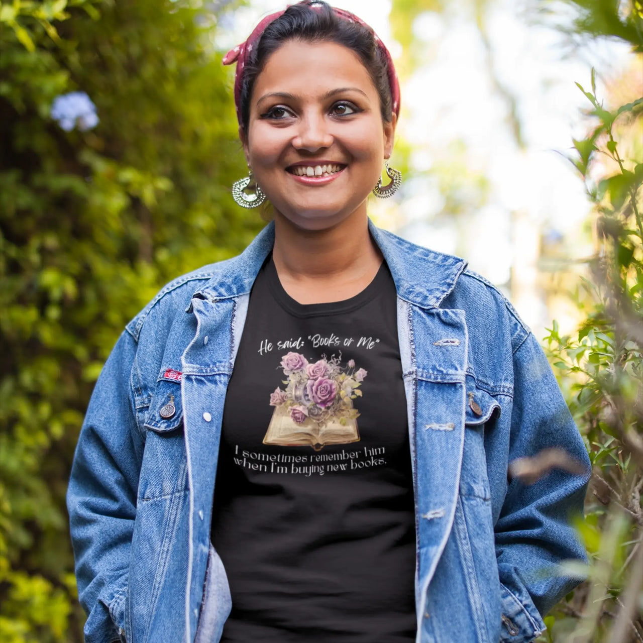 woman wearing a black books or me tshirt under a jean jacket