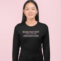 Thumbnail for woman wearing a Booktrovert long sleeve tshirt in black with pink text