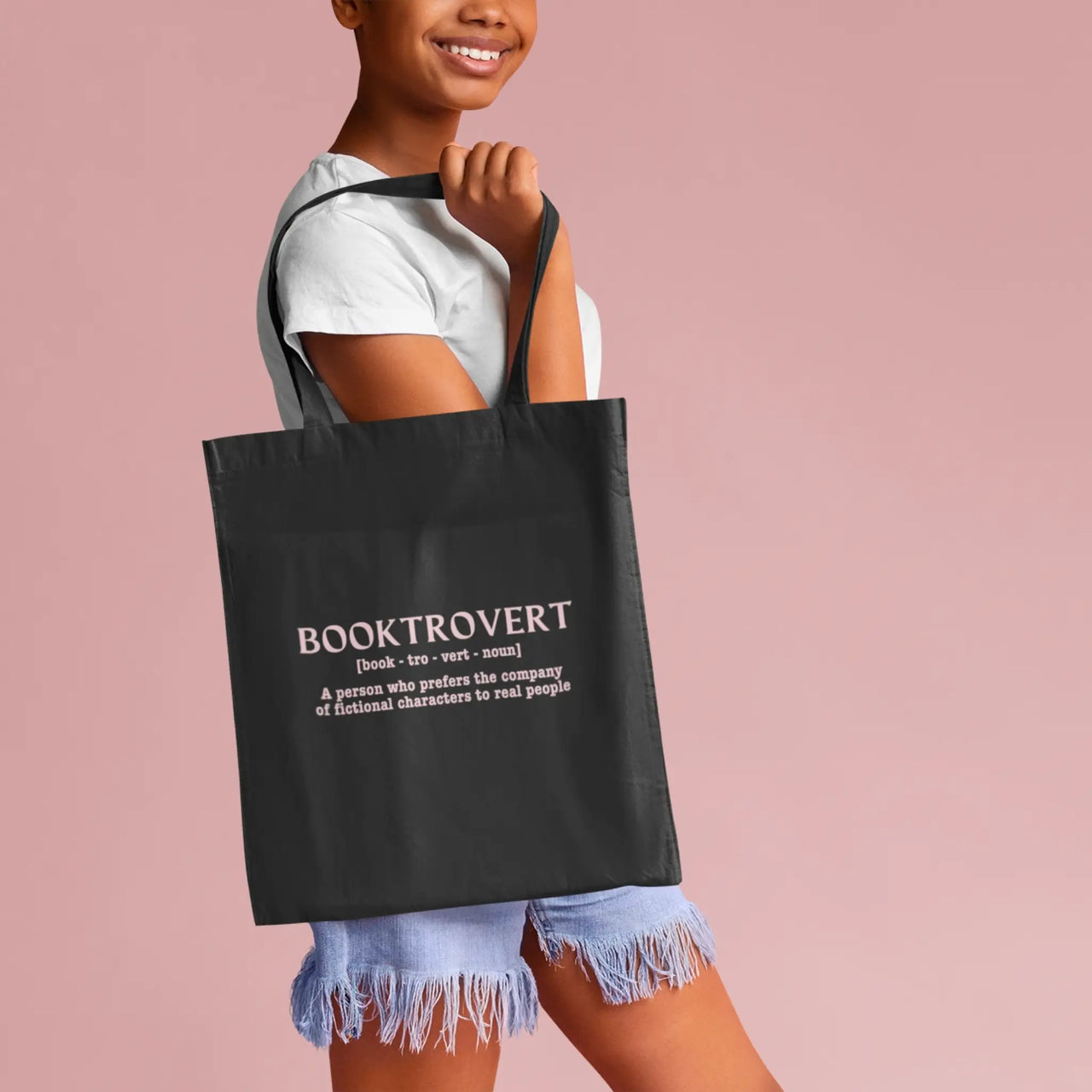 girl carrying a black booktrovert tote