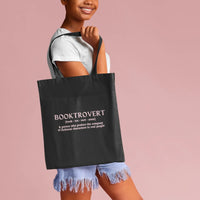 Thumbnail for girl carrying a black booktrovert tote