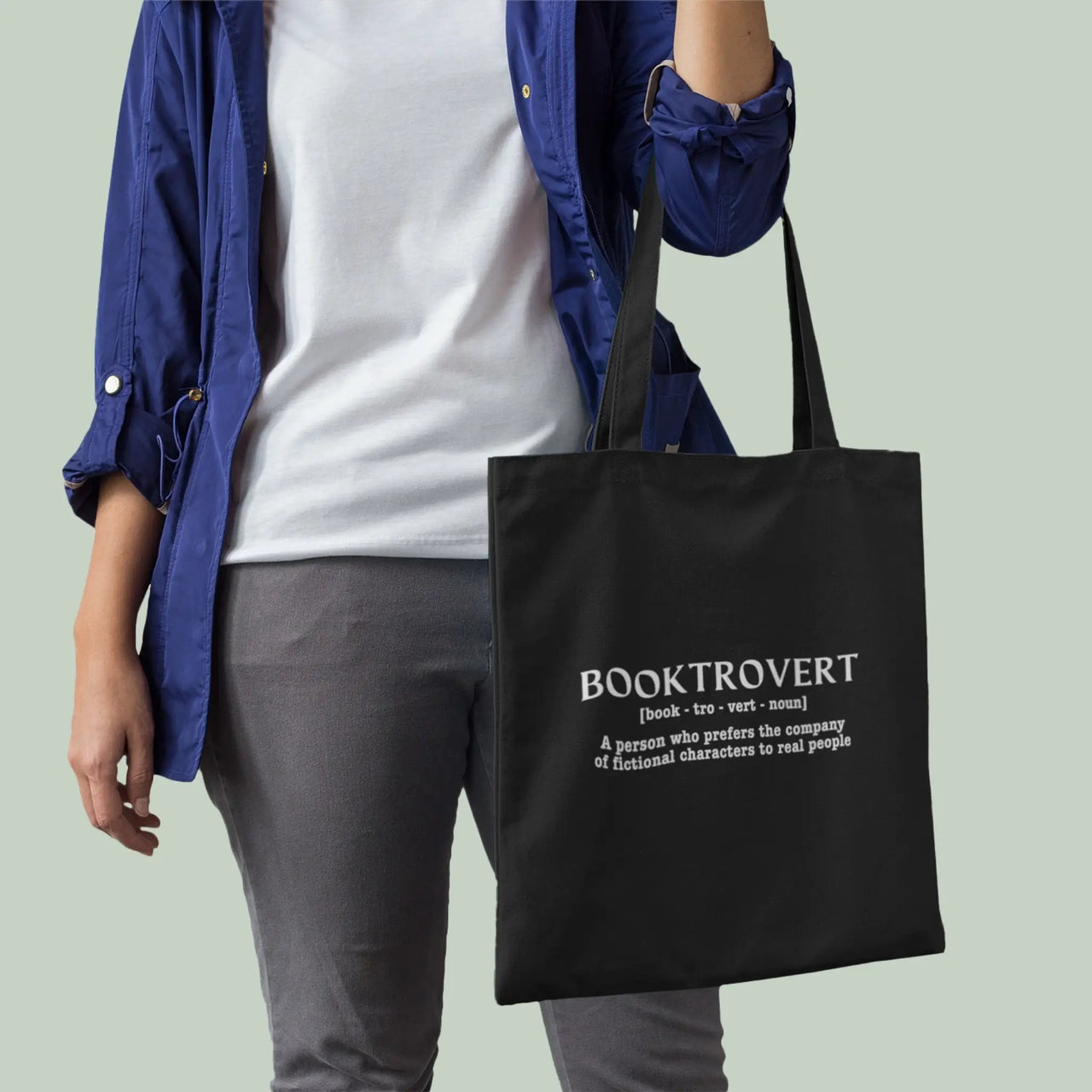 person carrying a black booktrovert tote