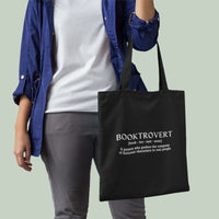 Thumbnail for person carrying a black booktrovert tote