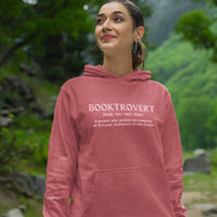 Thumbnail for woman wearing a dark pink booktrovert hoodie with pink text