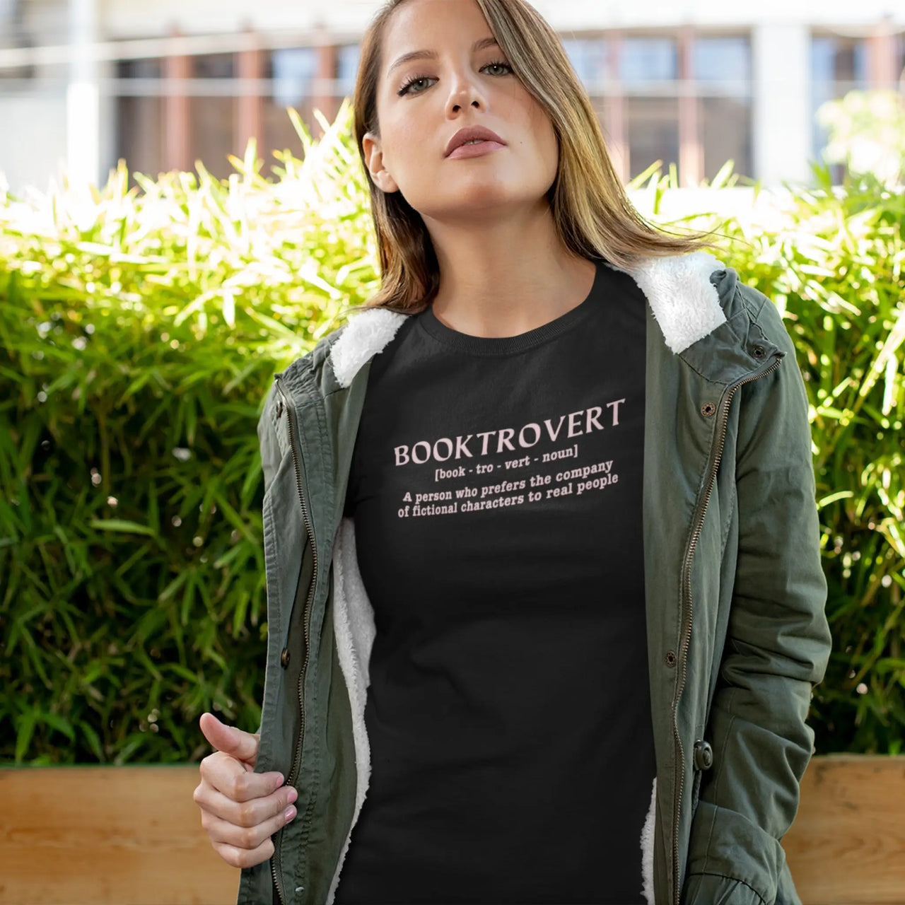 woman wearing a black booktrovert tshirt