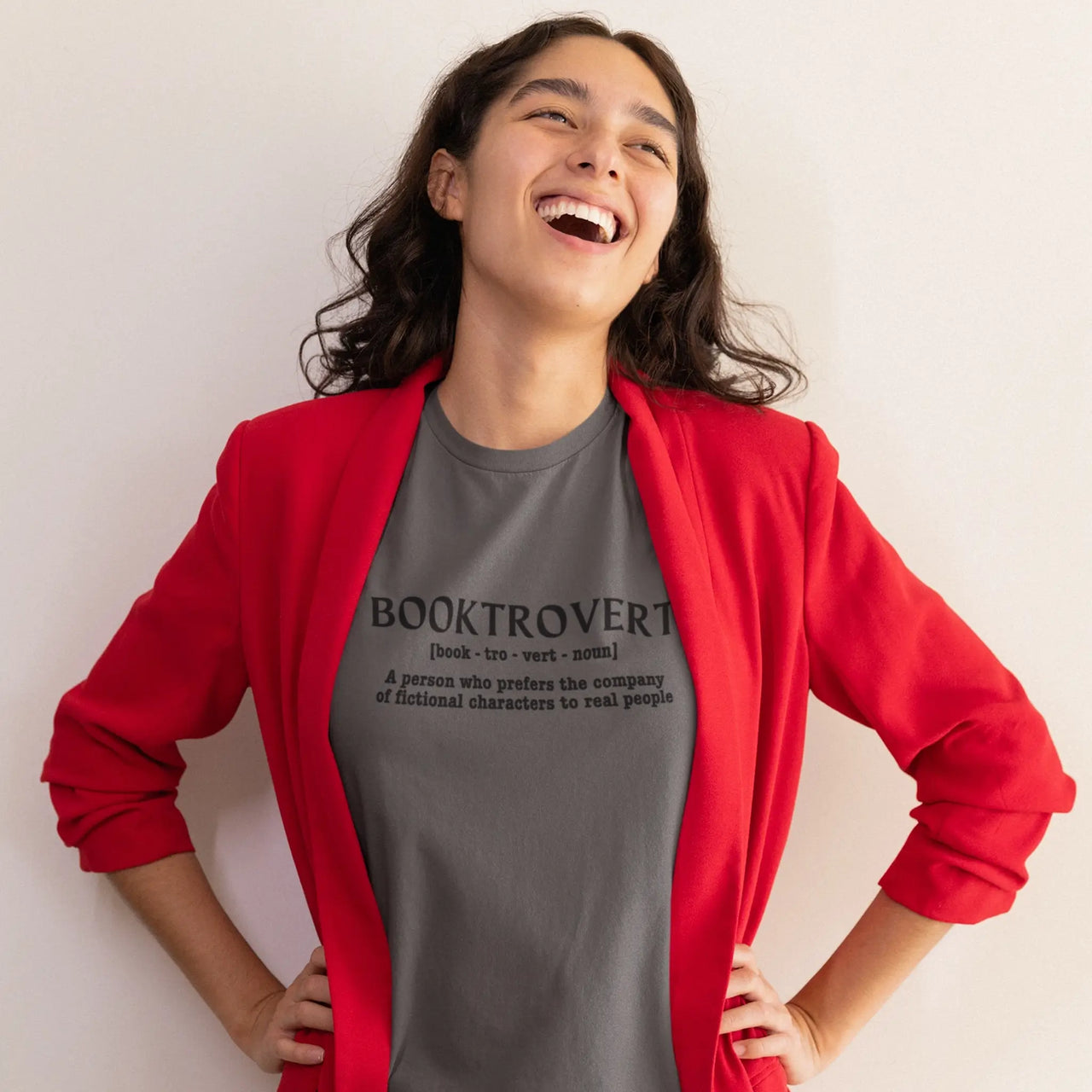 woman wearing a dark grey booktrovert tshirt