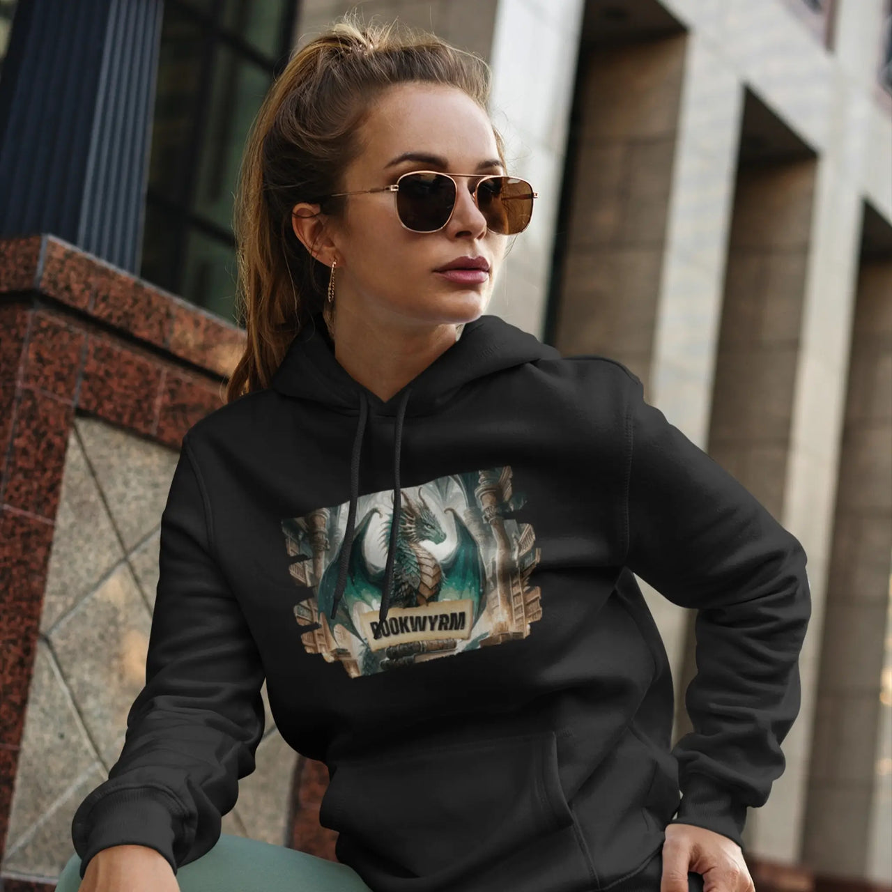 Woman in sunglasses wearing a Black Bookwyrm Hoodie