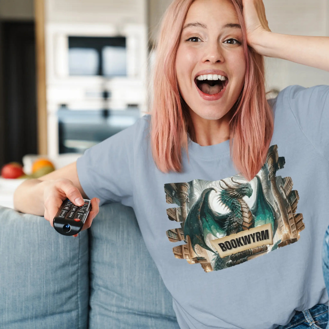 woman in a blue bookwyrm tee watching tv