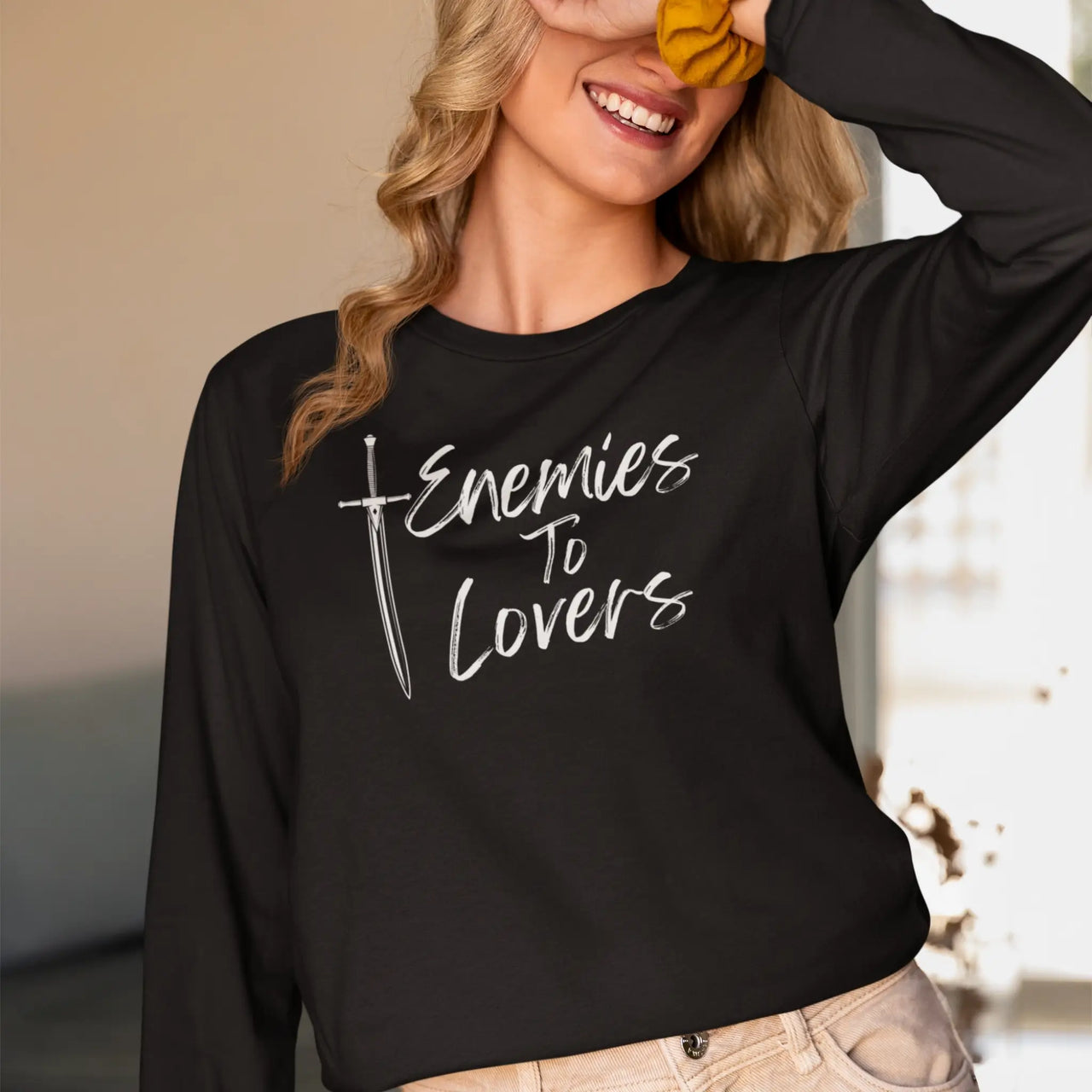 woman wearing a Enemies To Lovers Long Tshirt in black