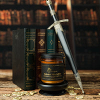 Thumbnail for Medium Enemies To Lovers scented candle with books and a dagger