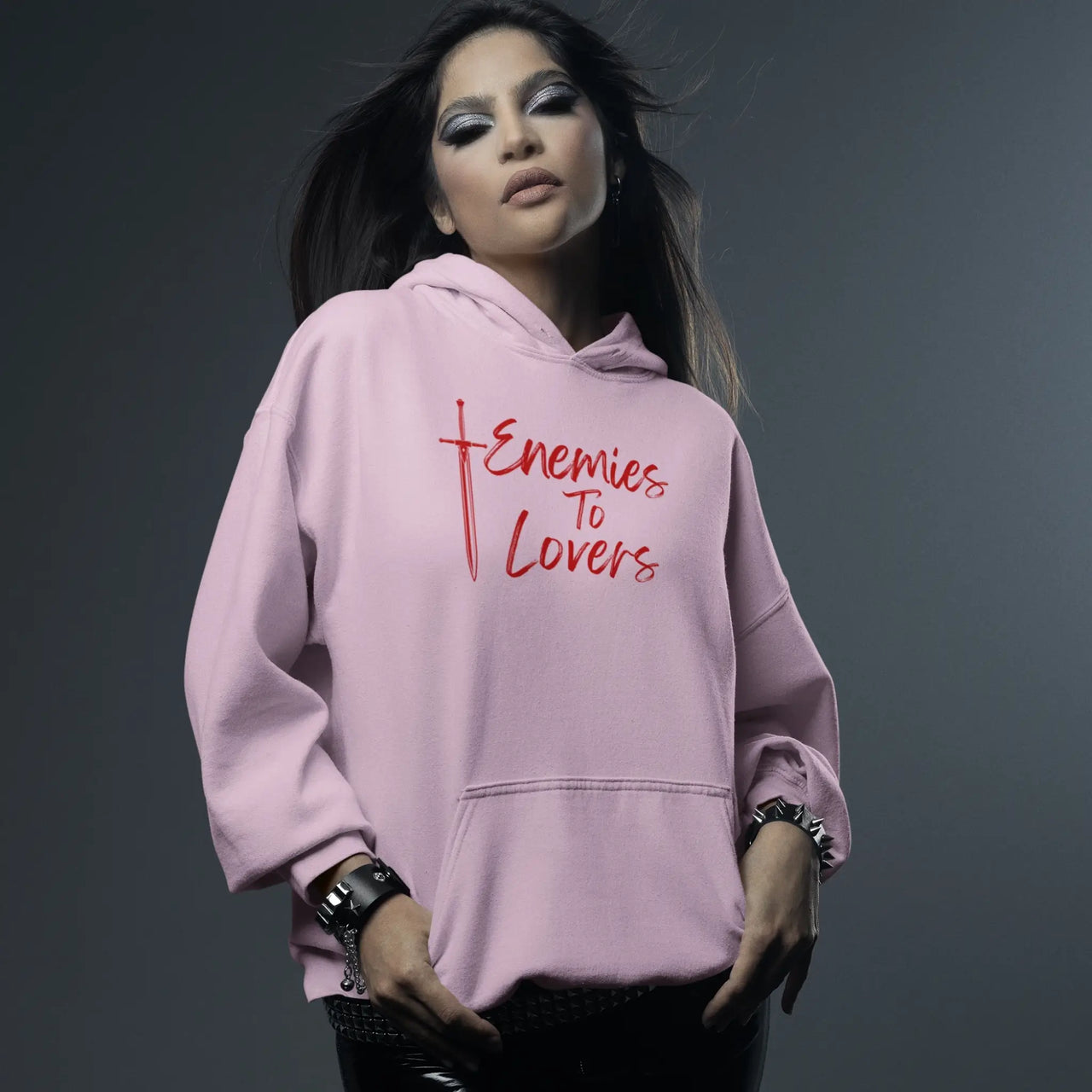 woman wearing a Pink Enemies To Lovers Hoodie