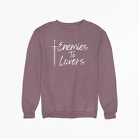 Thumbnail for the heather maroon Enemies To Lovers sweatshirt with white text