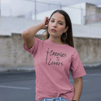 Thumbnail for a woman wearing a dark pink Enemies To Lovers Tshirt