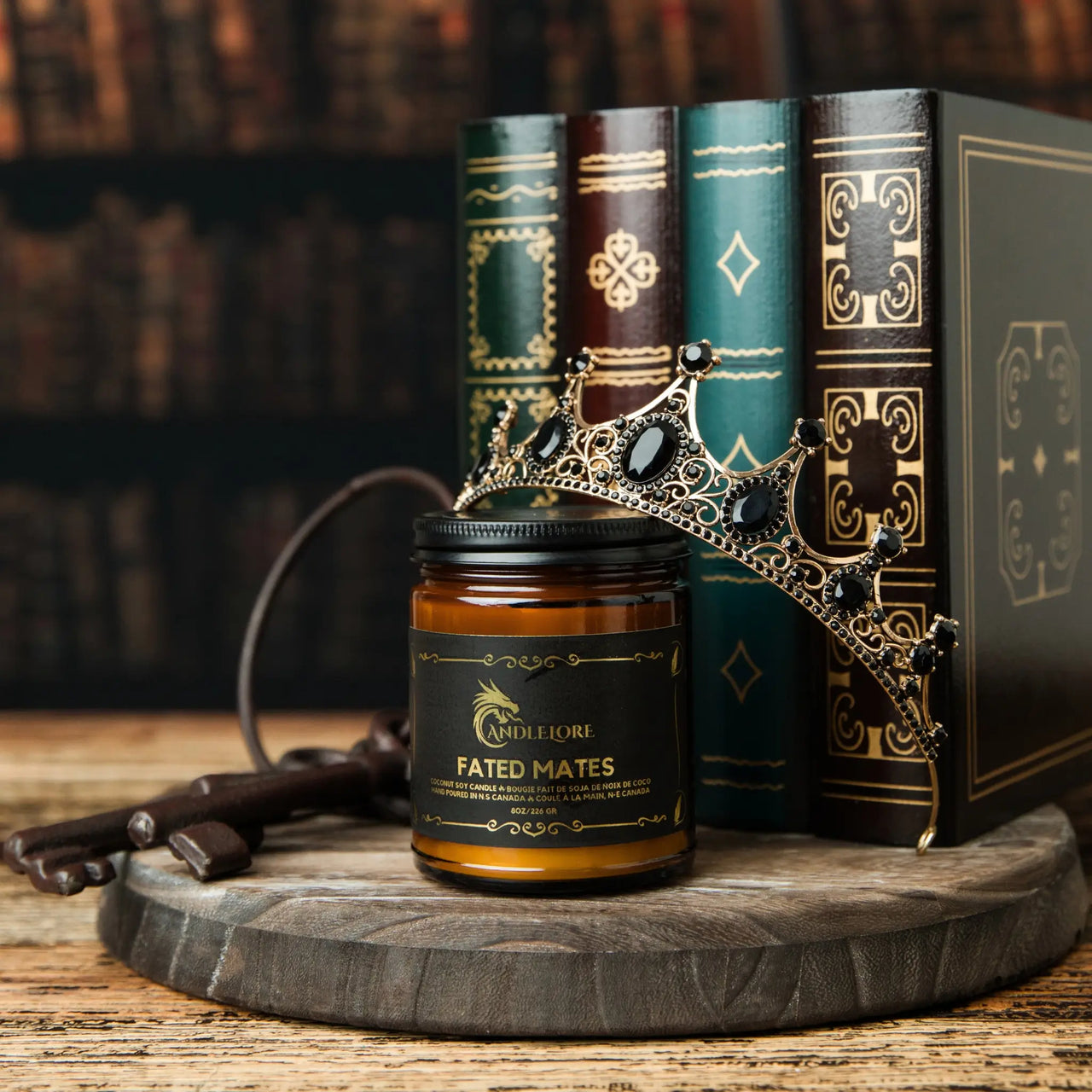 Fated Mates candle with books, keys, and crown