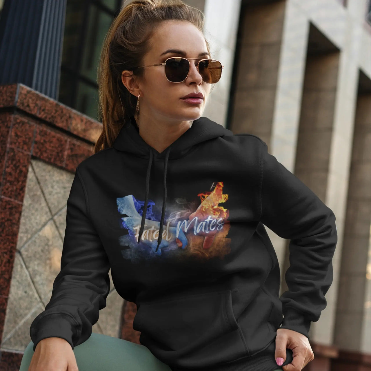 a young woman wearing a a black Fated Mates Hoodie