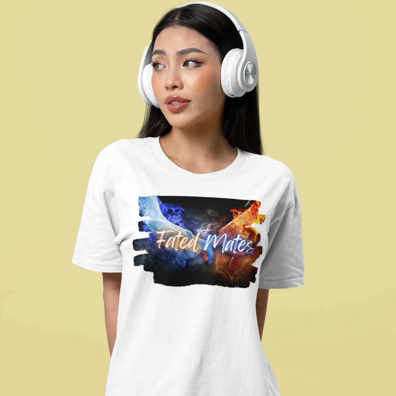 woman wearing headphones wearing a white Fated Mates Tshirt