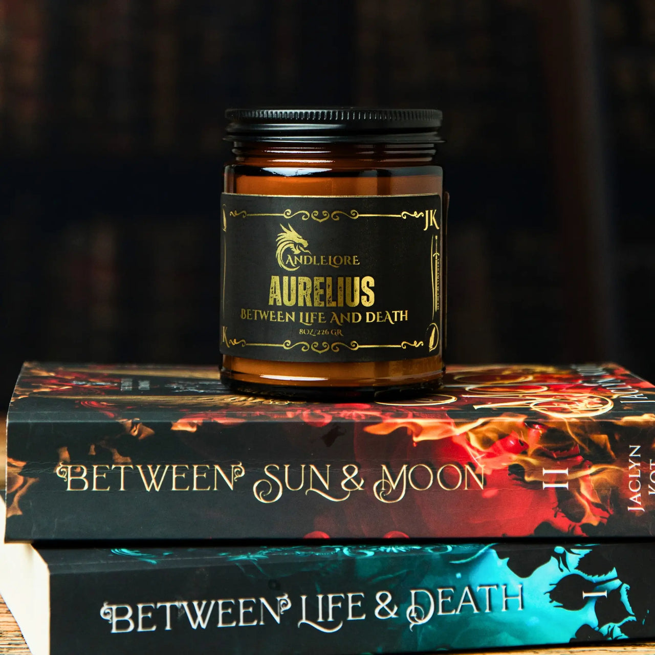 Aurelius candle on books