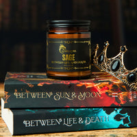 Thumbnail for Sage themed candle on books