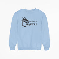 Thumbnail for light blue Just One More Chapter sweatshirt with black text