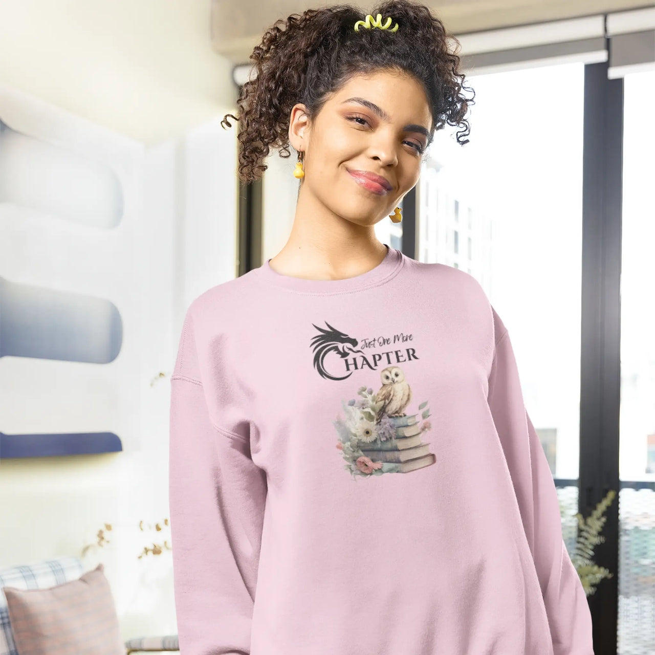 a woman displaying a Pink Just one more chapter sweatshirt v3