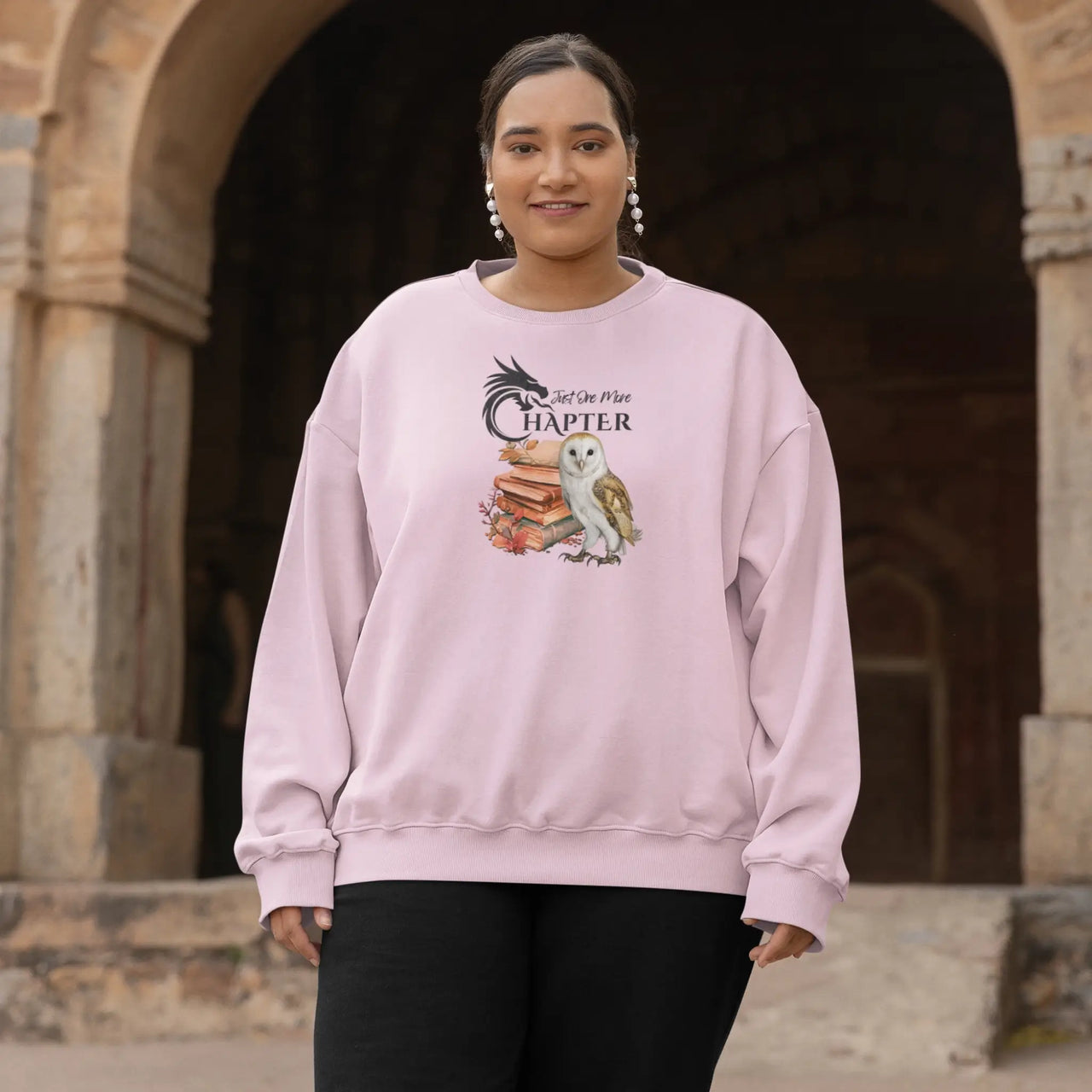 woman wearing our pink just one more chapter sweatshirt v2