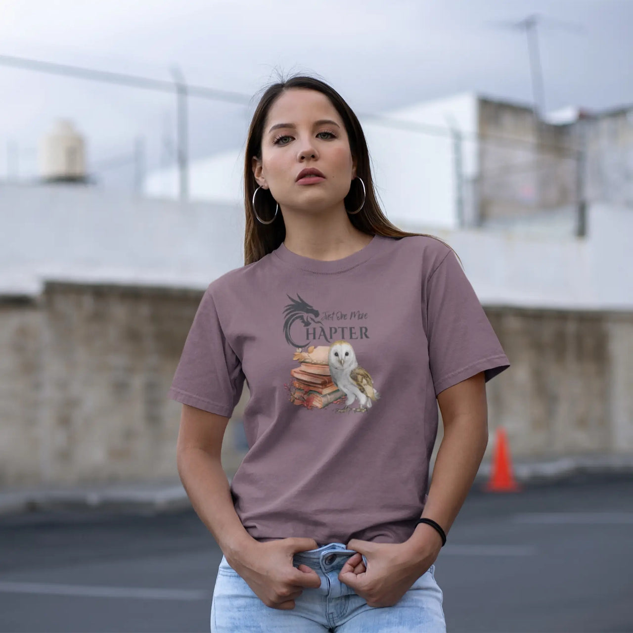 woman posing with our maroon Just One More Chapter Tshirt V2