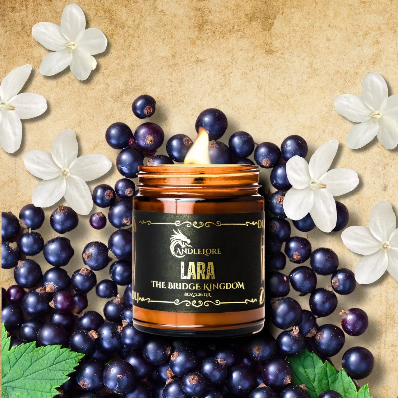 Lit Lara candle on currants and jasmine