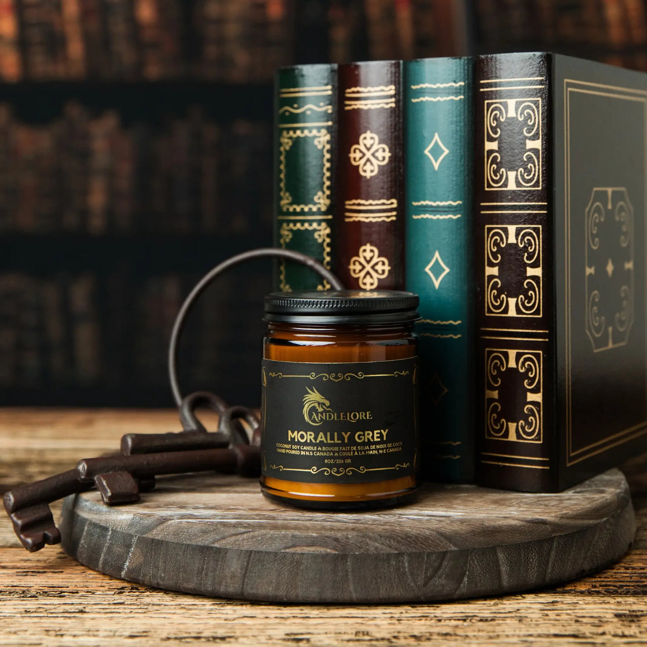 Medium Morally Grey scented candle with keys and books