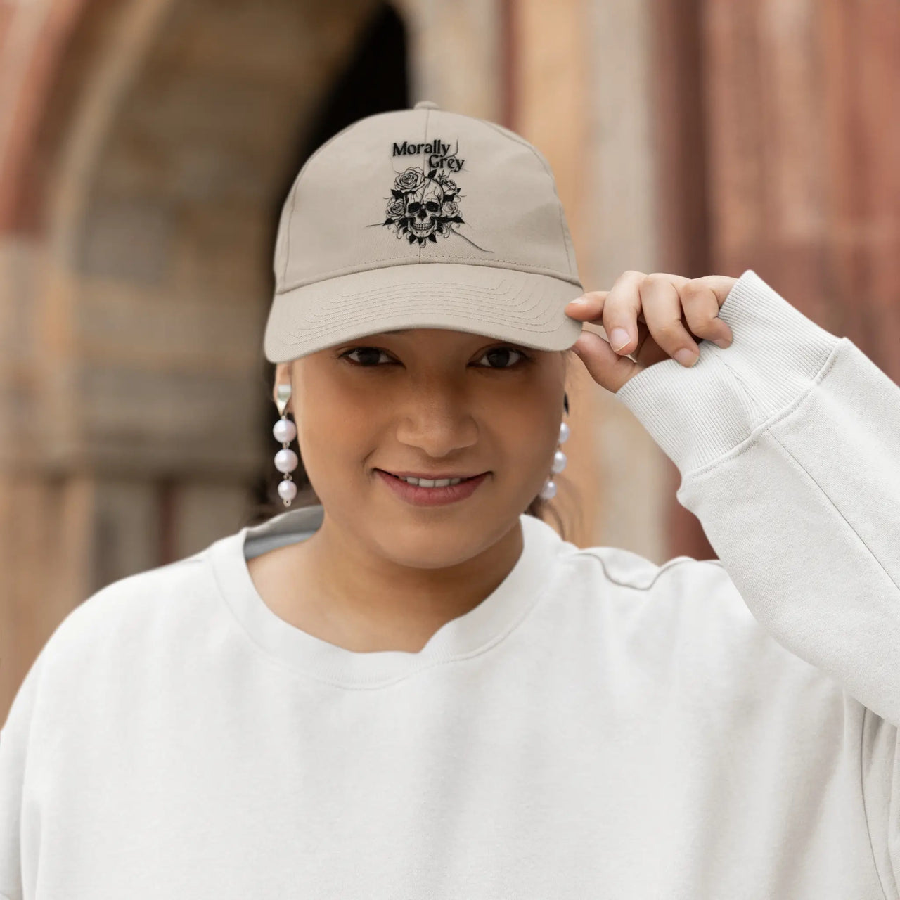 woman wearing a Morally Grey cap