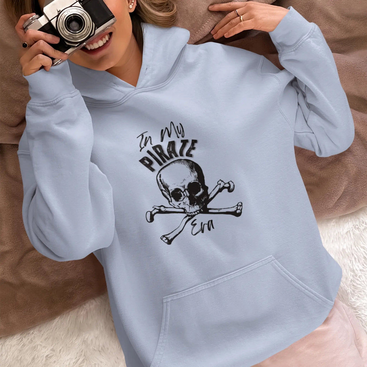 woman with a camera wearing a Blue In My Pirate Era Hoodie